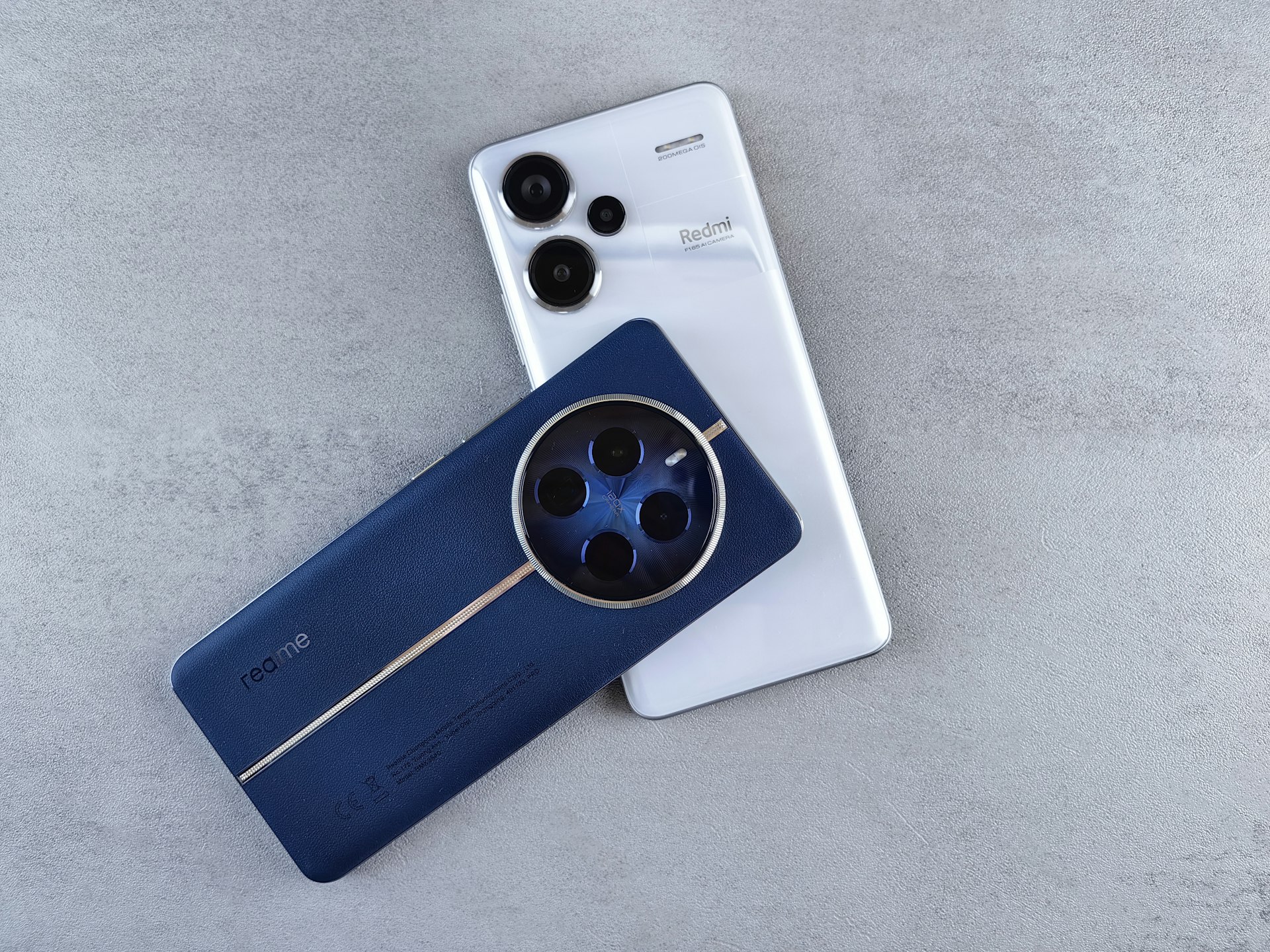 A pair of blue and white remote controls